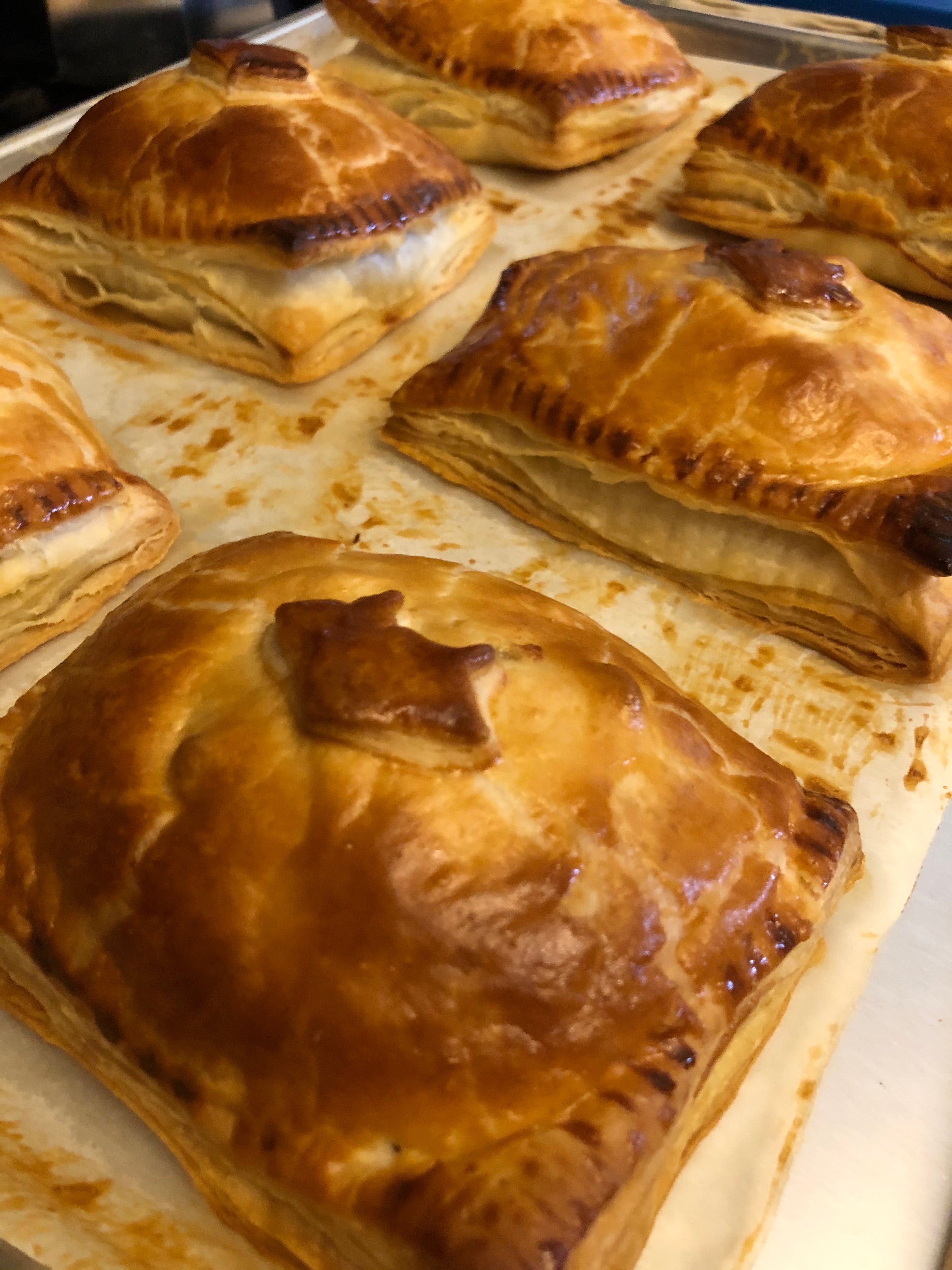 Baked hand pies on a baking sheet